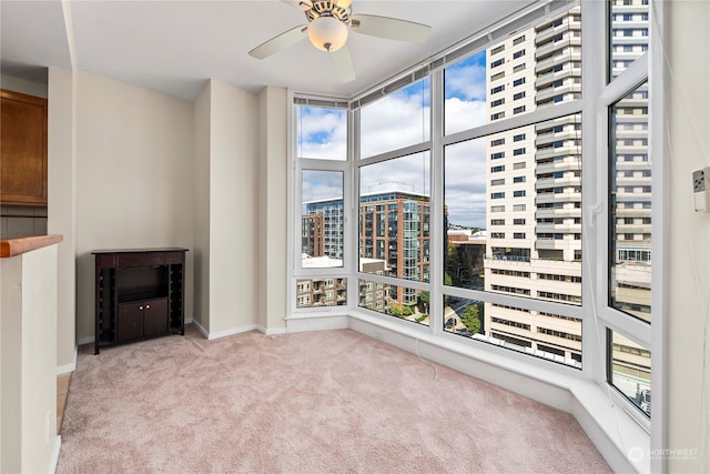 interior space featuring a wealth of natural light and ceiling fan