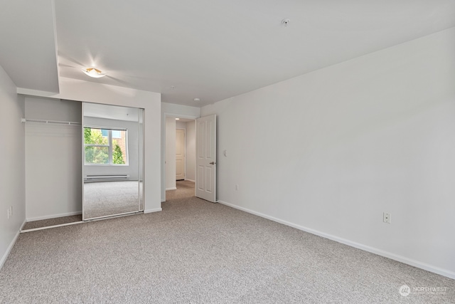 unfurnished bedroom featuring a closet and carpet floors