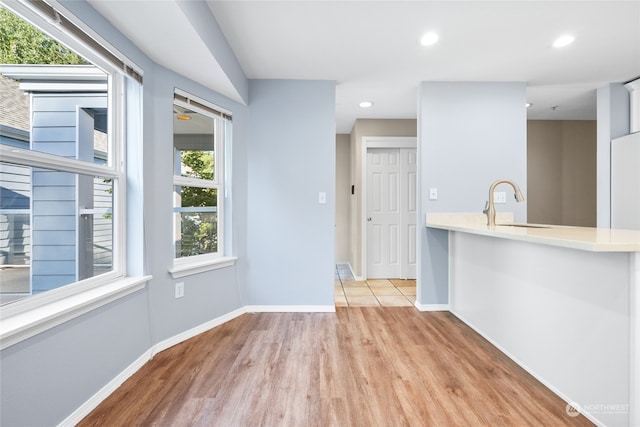 kitchen featuring sink and light hardwood / wood-style floors