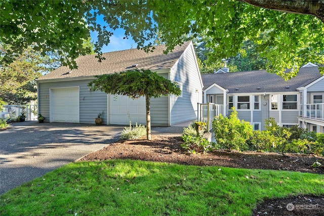 view of side of property featuring a garage