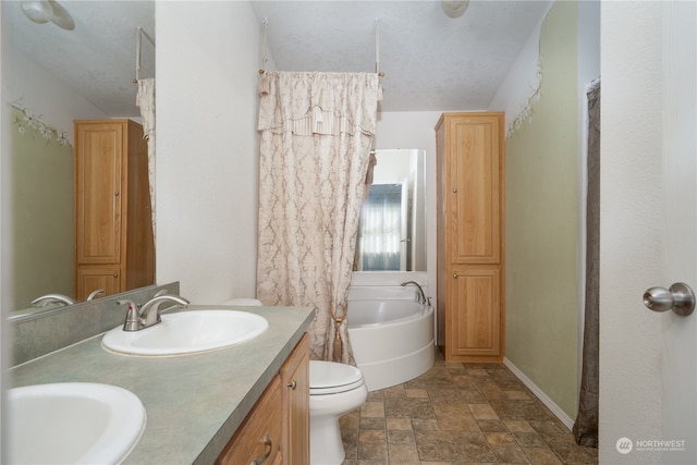 full bathroom featuring plus walk in shower, toilet, a textured ceiling, and vanity