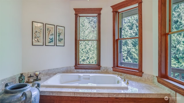 bathroom featuring a relaxing tiled tub