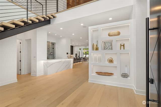 interior space with light hardwood / wood-style floors