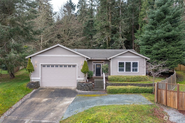 single story home featuring a garage and a front lawn