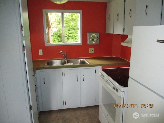 kitchen featuring extractor fan, white appliances, sink, and white cabinets