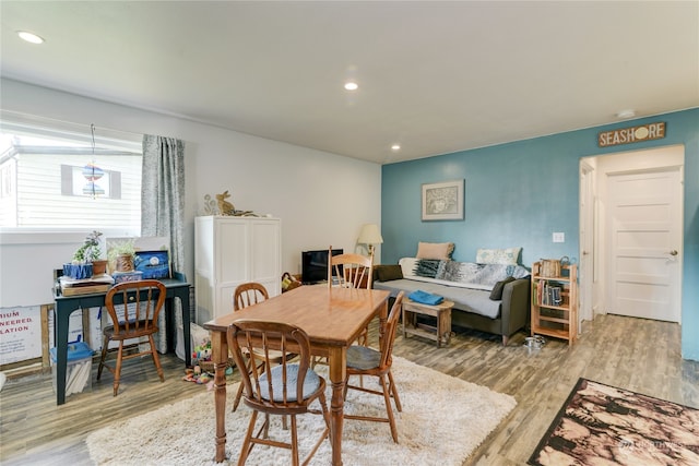 dining space featuring hardwood / wood-style flooring