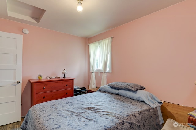 bedroom featuring hardwood / wood-style floors