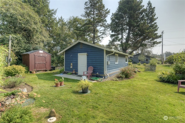 view of outbuilding with a lawn