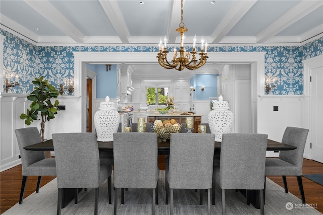 dining area featuring crown molding, hardwood / wood-style floors, beamed ceiling, and a chandelier