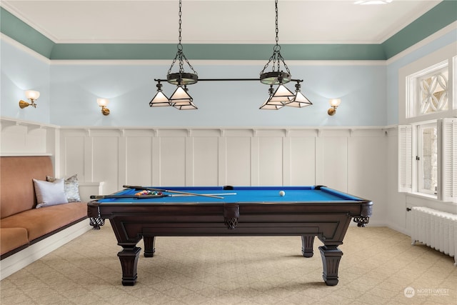 recreation room featuring ornamental molding, radiator, and pool table