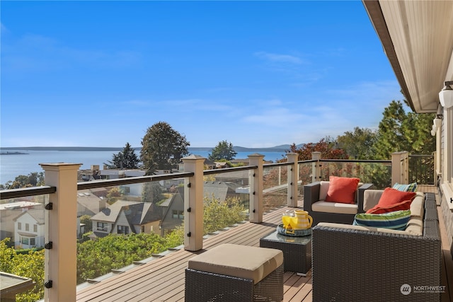 balcony featuring a water view