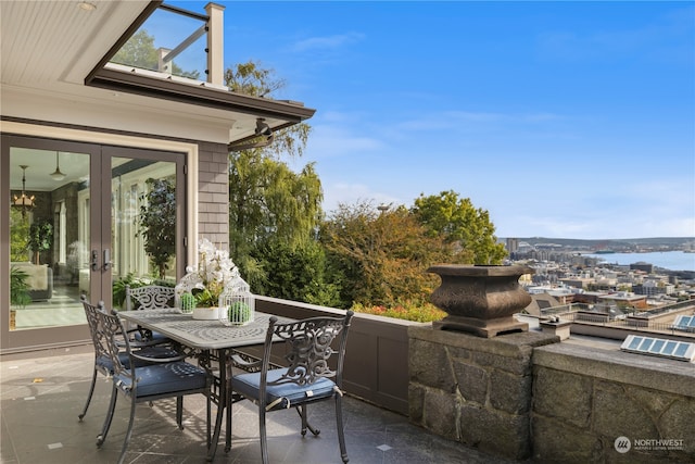 view of patio / terrace featuring a water view