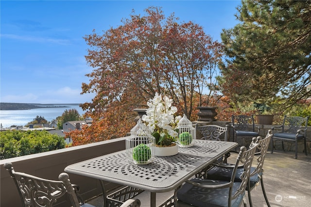 view of patio / terrace featuring a water view