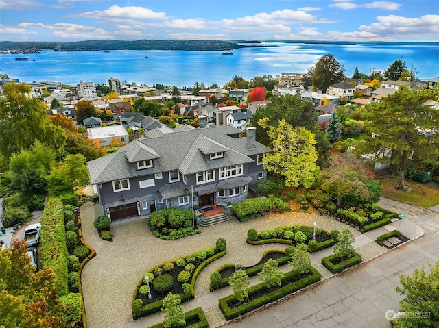 bird's eye view with a water view