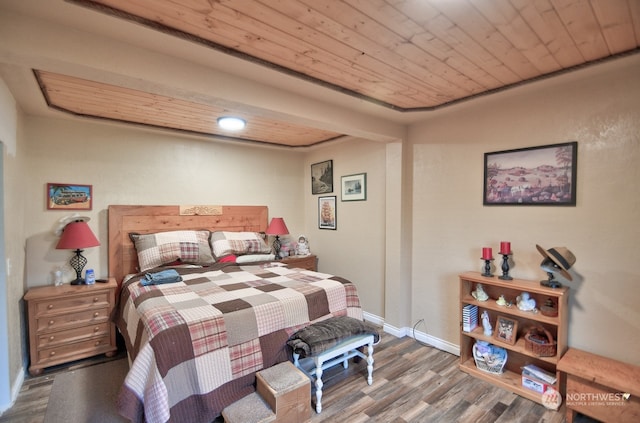 bedroom featuring hardwood / wood-style flooring and wooden ceiling