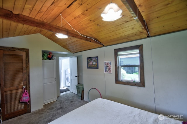 bedroom with carpet flooring, washer / clothes dryer, wood ceiling, and vaulted ceiling with beams