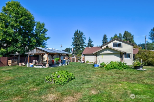 view of yard featuring a patio area and a gazebo