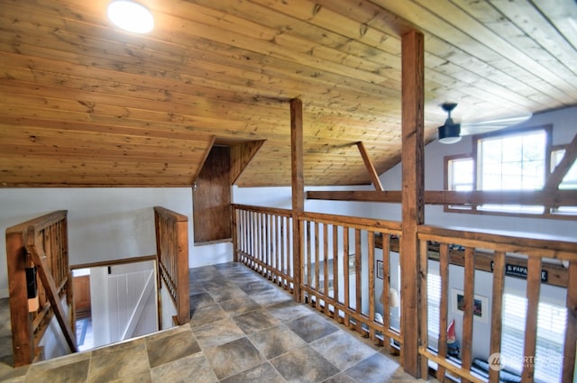 corridor with vaulted ceiling and wooden ceiling