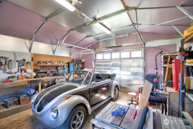 garage featuring a workshop area