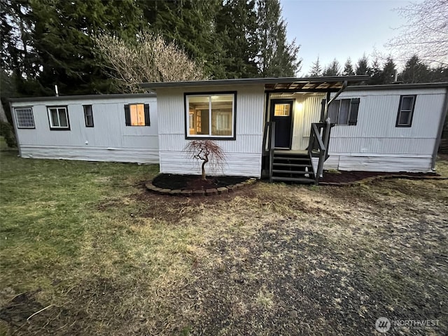 8 Griffard St, Copalis Beach, WA 98535 - manufactured / mobile home featuring a front lawn