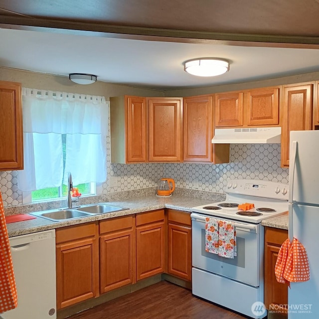 8 Griffard St, Copalis Beach, WA 98535 - kitchen with white appliances, under cabinet range hood, backsplash, light countertops, and dark wood-style floors