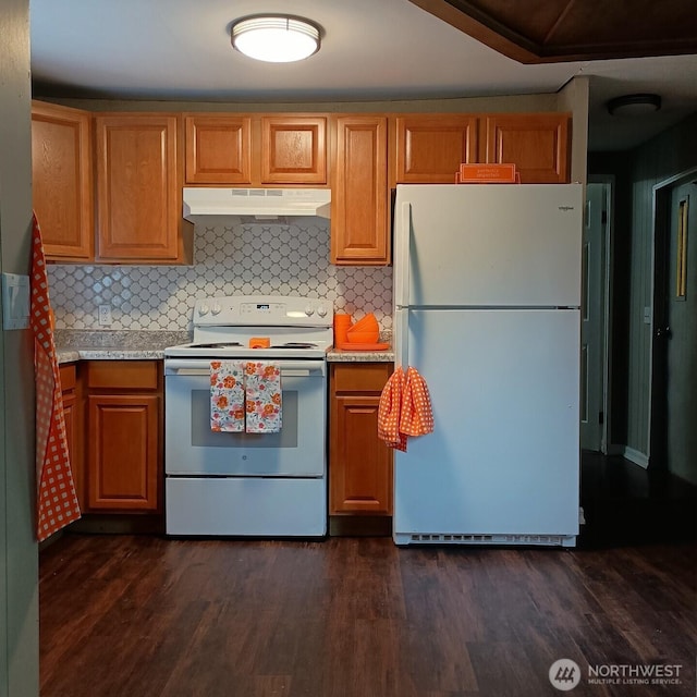 8 Griffard St, Copalis Beach, WA 98535 - kitchen featuring white appliances, under cabinet range hood, light countertops, and dark wood finished floors