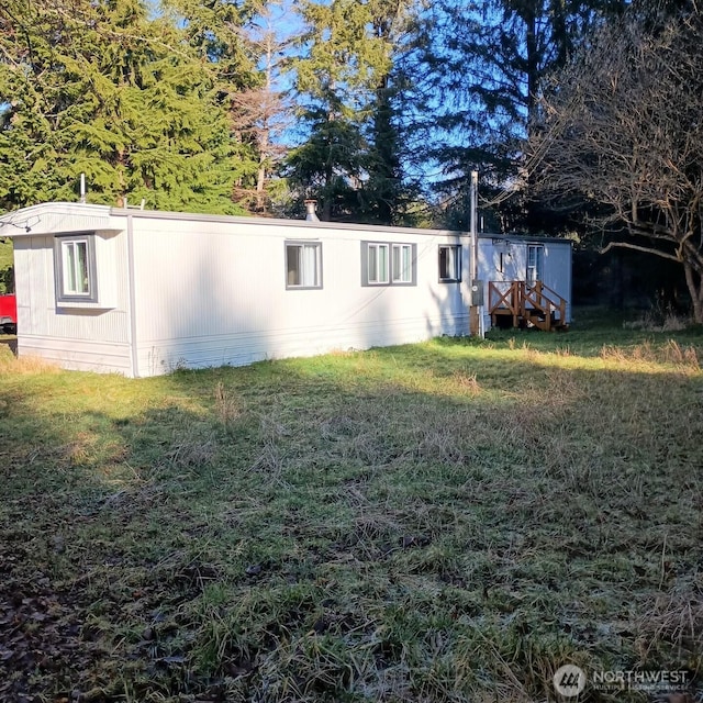 8 Griffard St, Copalis Beach, WA 98535 - view of front of home with a front yard