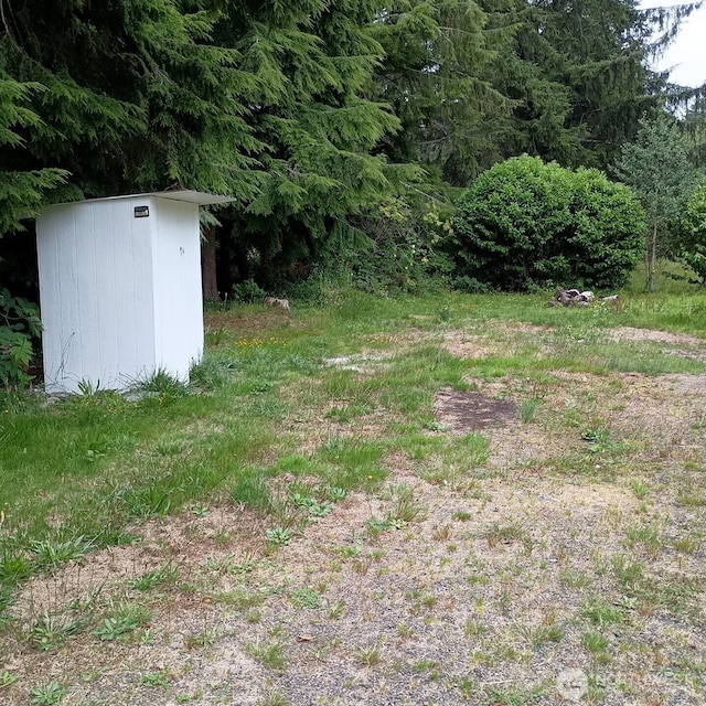 8 Griffard St, Copalis Beach, WA 98535 - view of yard featuring a storage shed