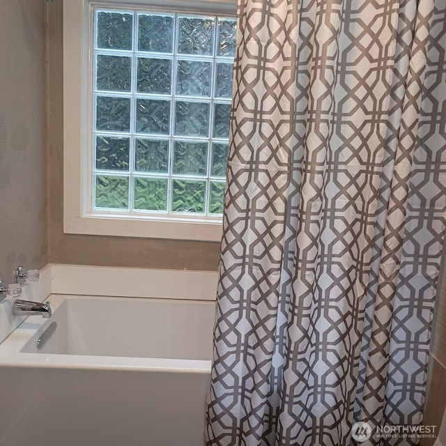 8 Griffard St, Copalis Beach, WA 98535 - bathroom featuring a tub and a shower with shower curtain