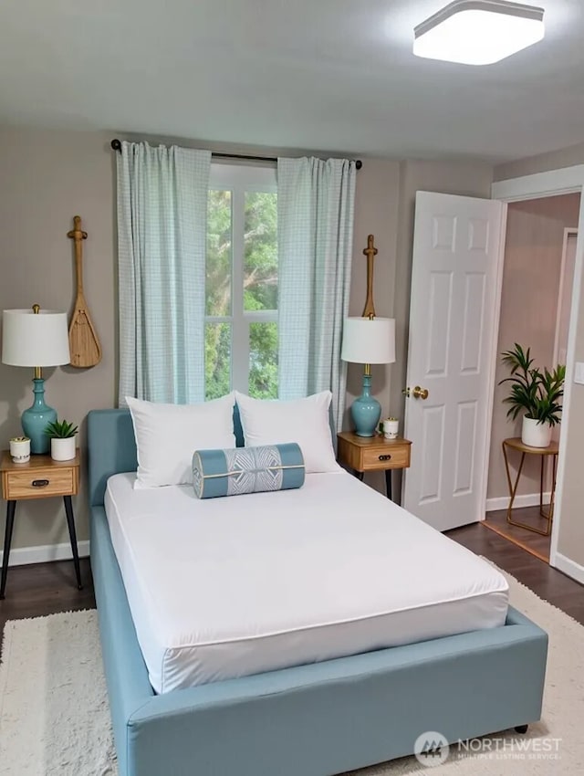 8 Griffard St, Copalis Beach, WA 98535 - bedroom featuring dark wood finished floors