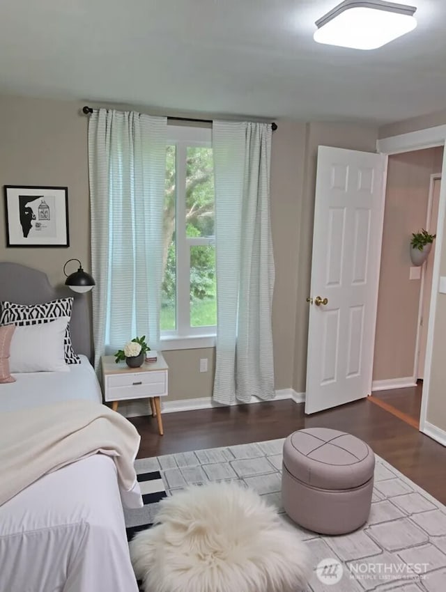 8 Griffard St, Copalis Beach, WA 98535 - bedroom featuring wood finished floors and baseboards