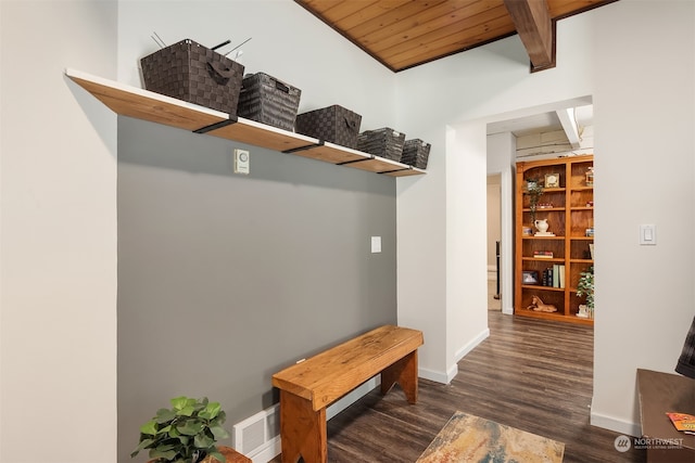 mudroom with wooden ceiling, dark wood-type flooring, and beam ceiling