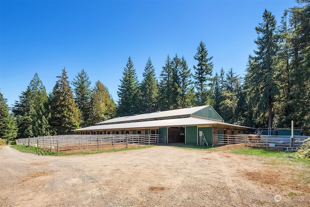 view of front facade with an outbuilding