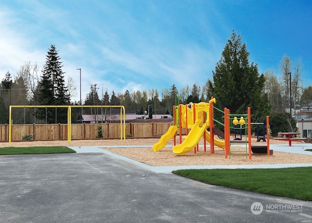 community playground featuring fence