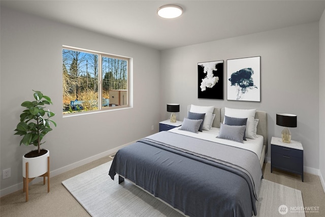 bedroom featuring baseboards and carpet floors