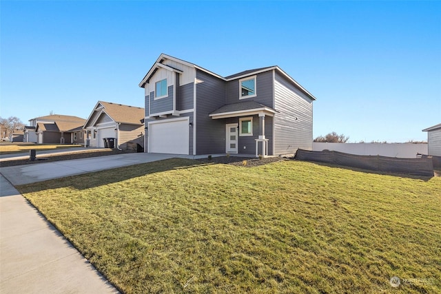 view of front of house with a garage and a front yard