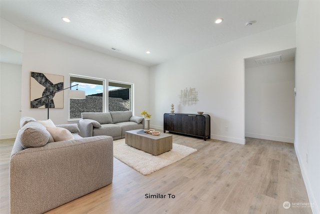 living room featuring light wood-type flooring