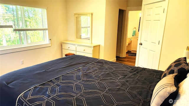 bedroom featuring wood-type flooring