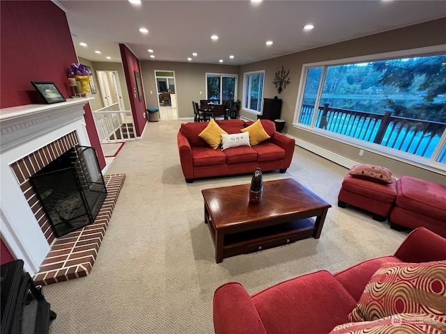 carpeted living room with a fireplace