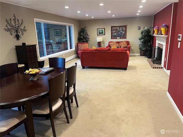 view of carpeted dining area