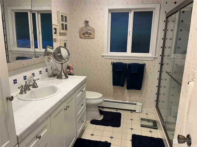 bathroom featuring vanity, baseboard heating, walk in shower, and decorative backsplash