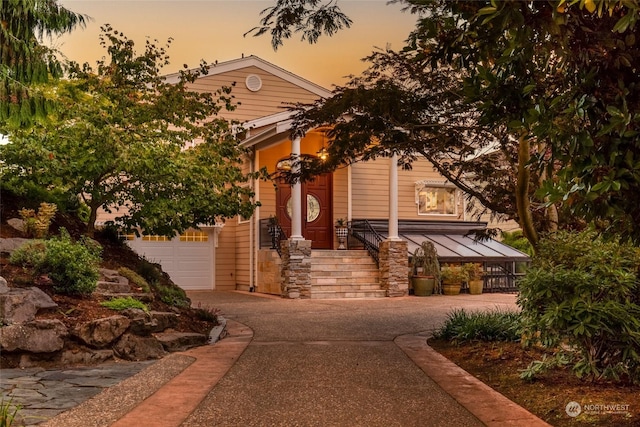 view of front facade featuring a garage and concrete driveway