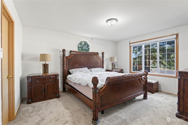 bedroom with light carpet