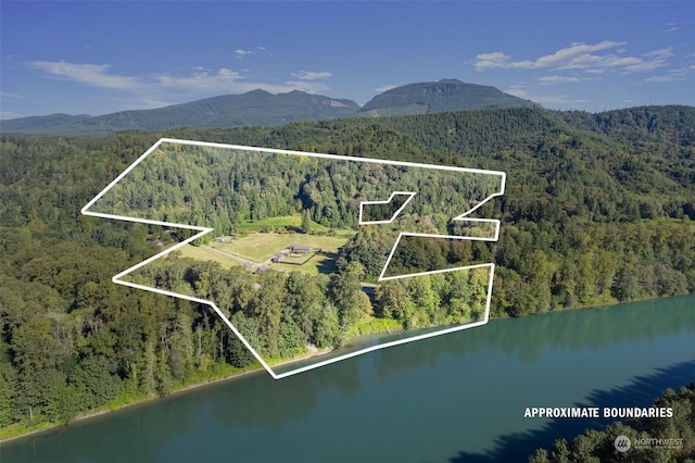 bird's eye view featuring a water and mountain view