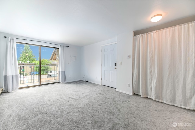 empty room featuring carpet flooring