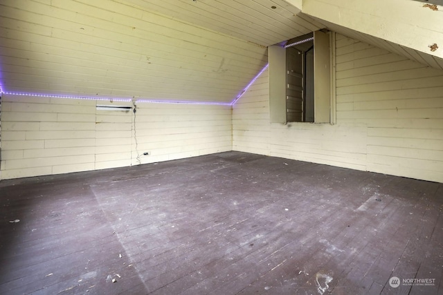 additional living space with wooden ceiling, lofted ceiling, and hardwood / wood-style floors