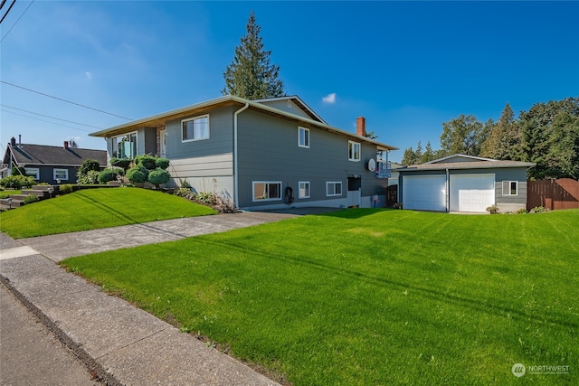 exterior space with a front yard and a garage