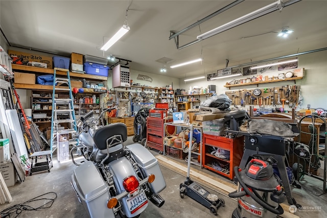 garage with a workshop area