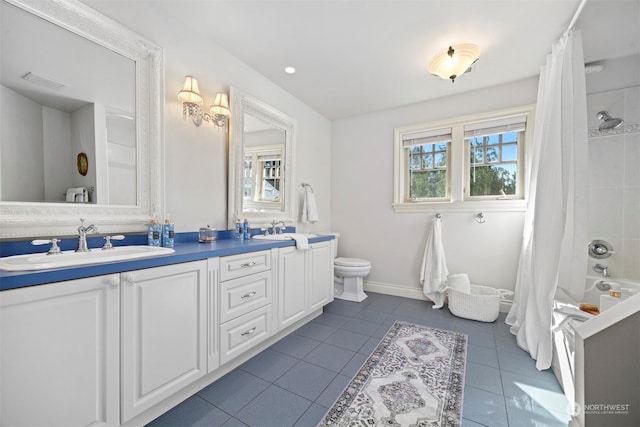 full bathroom featuring double vanity, shower / bathtub combination with curtain, toilet, a sink, and tile patterned flooring