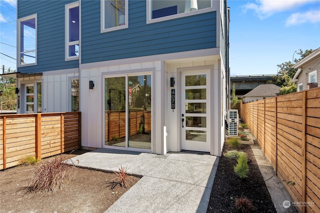 back of property with a patio area